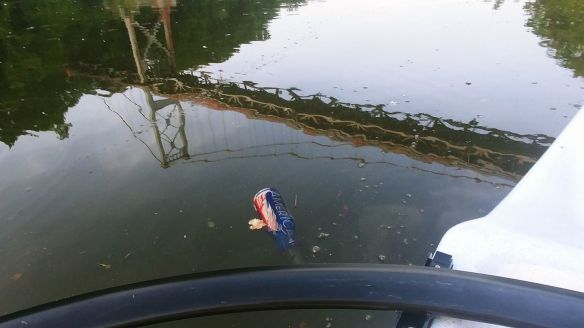 Lady Liberty trash in creek